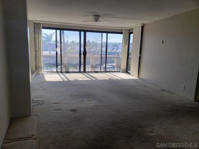 a view of a hallway with closet
