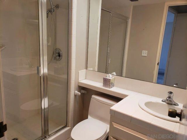 a bathroom with a sink and a toilet