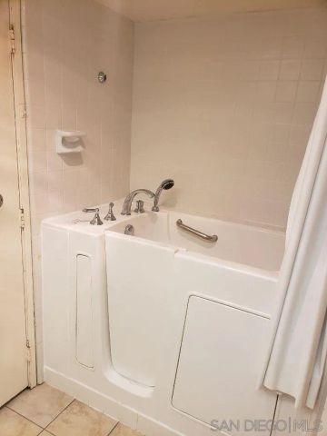 a view of parking space with parked cars