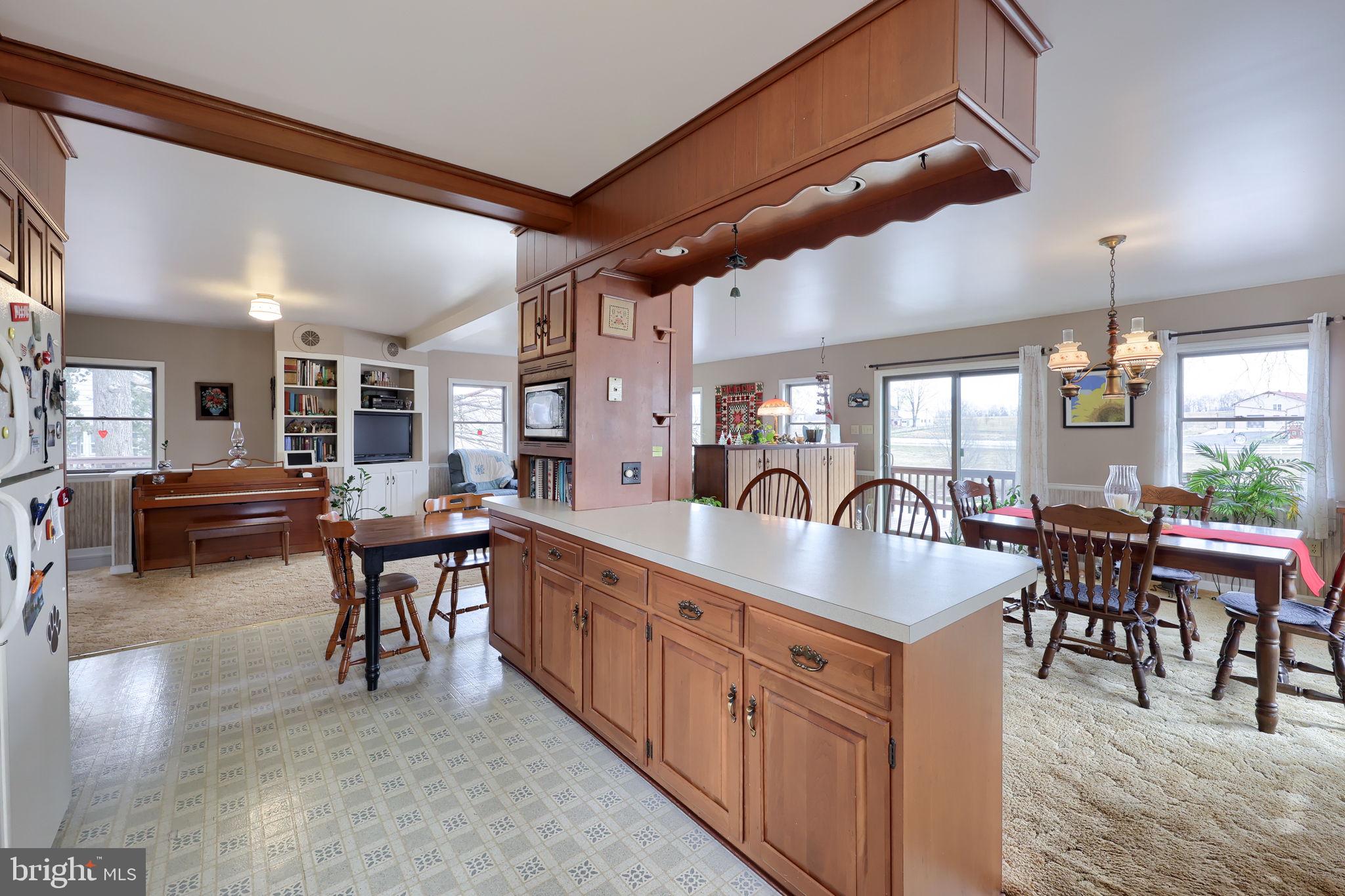 291 Bushong Road Leola, PA 17540 - Photo 19 of 81 a large kitchen with lots of counter space dining table and chairs