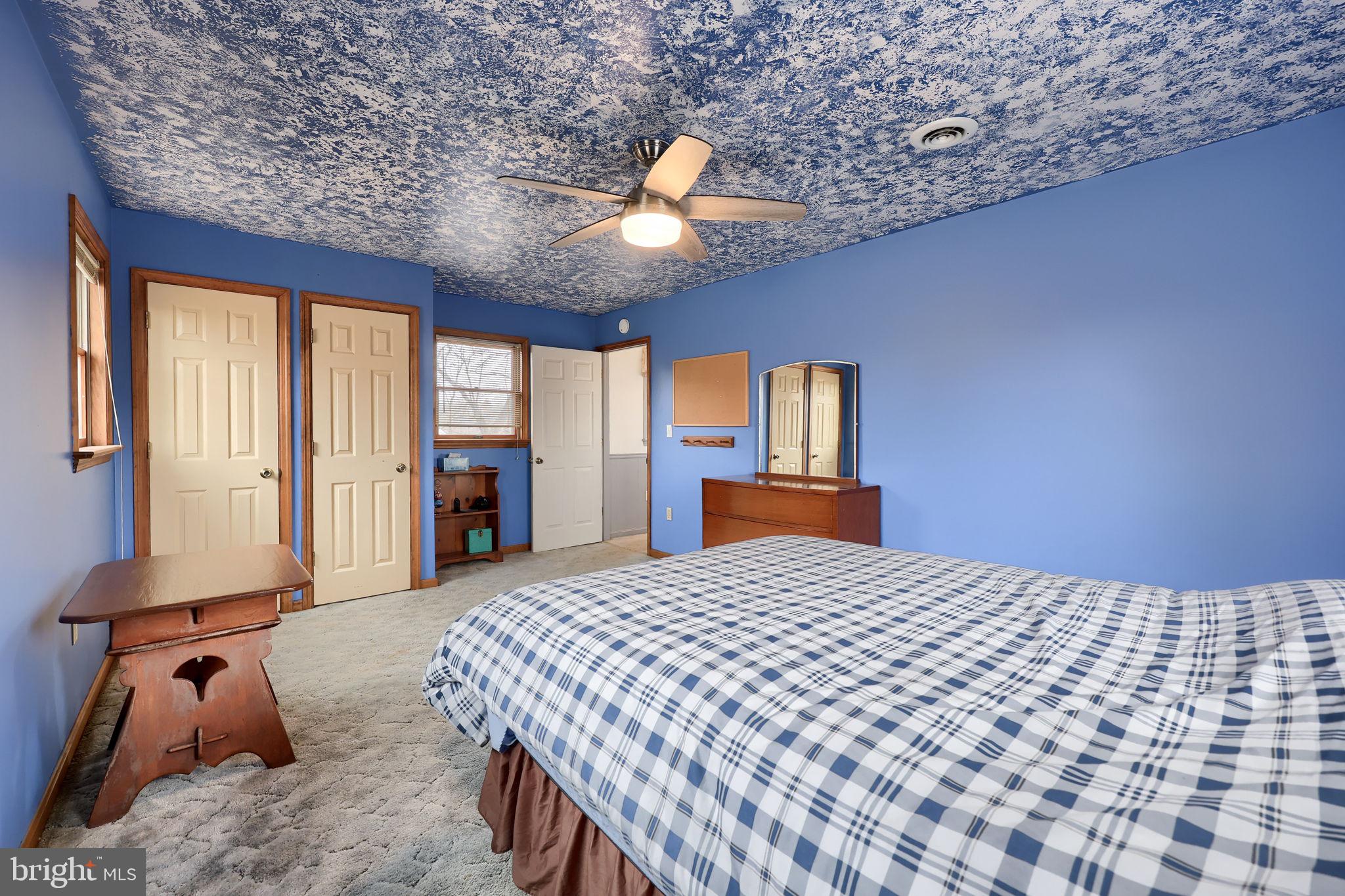 291 Bushong Road Leola, PA 17540 - Photo 37 of 81 a bedroom with a large bed and a window