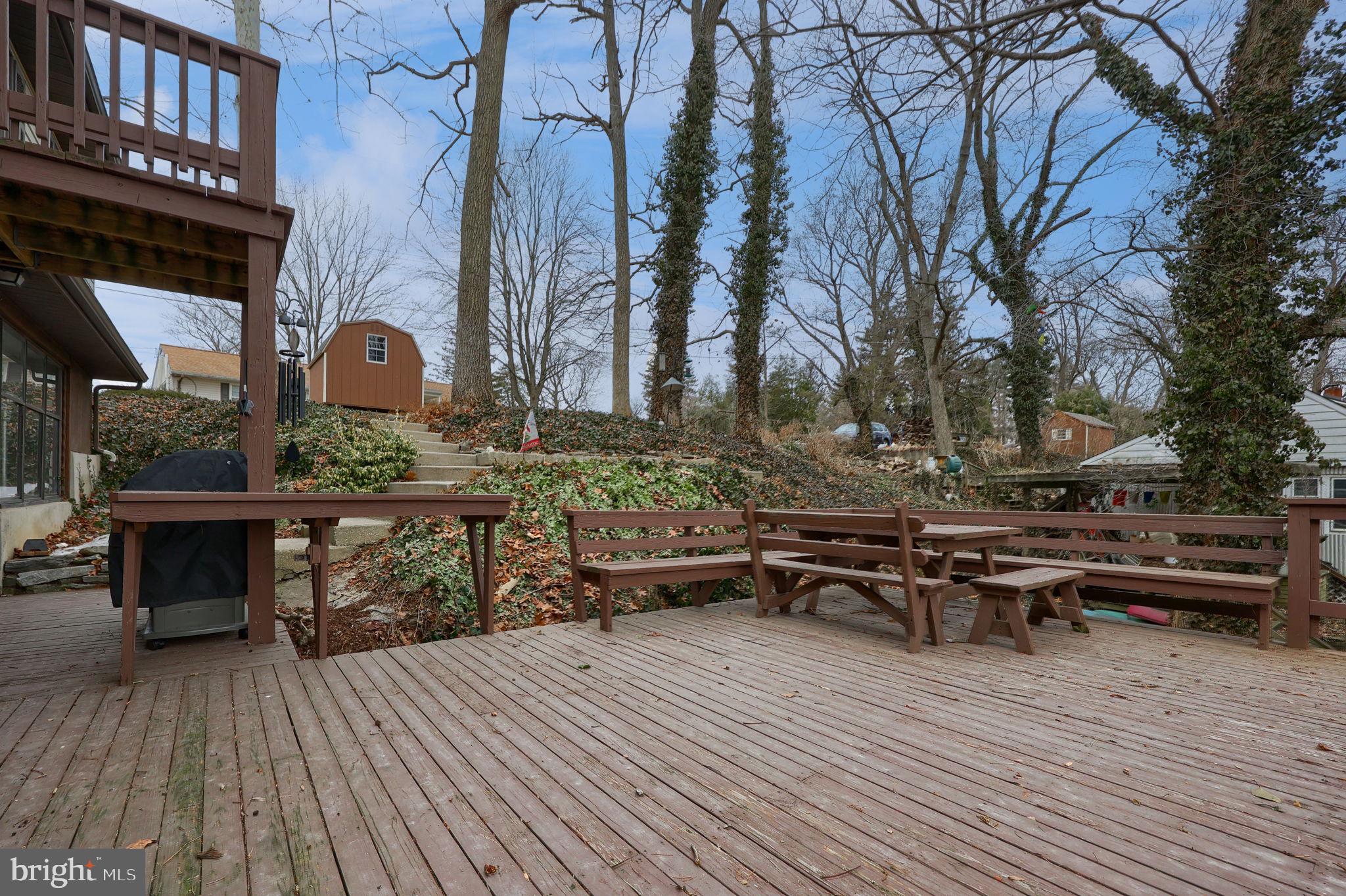 291 Bushong Road Leola, PA 17540 - Photo 69 of 81 a view of a roof deck with table and chairs with wooden floor and fence