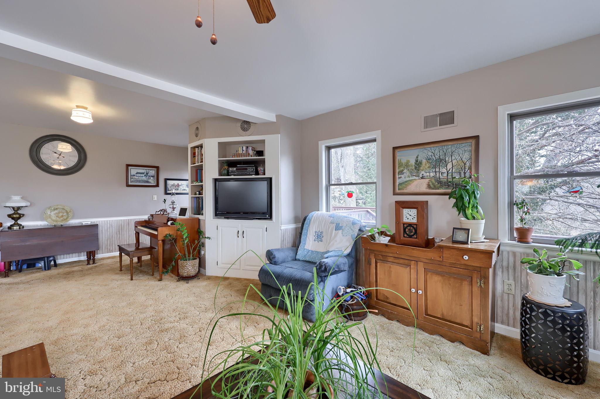 291 Bushong Road Leola, PA 17540 - Photo 8 of 81 a living room with furniture and a flat screen tv