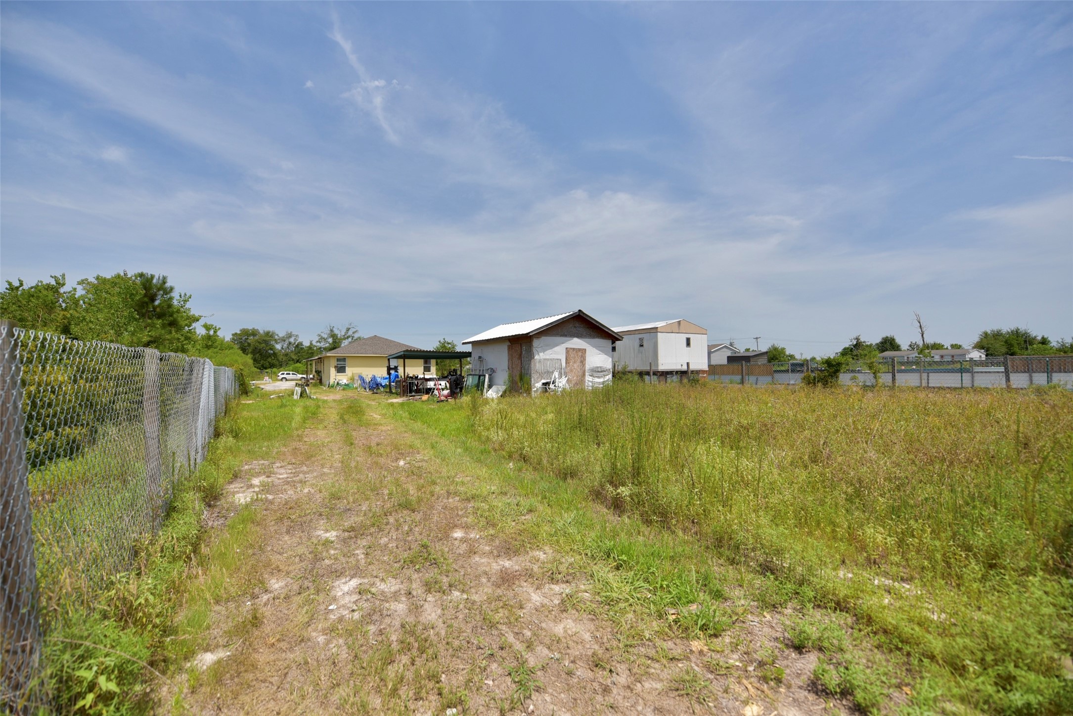 382 Road 5251 Cleveland, TX 77327 - Photo 4 of 22 Expansive storage shed for all your needs.