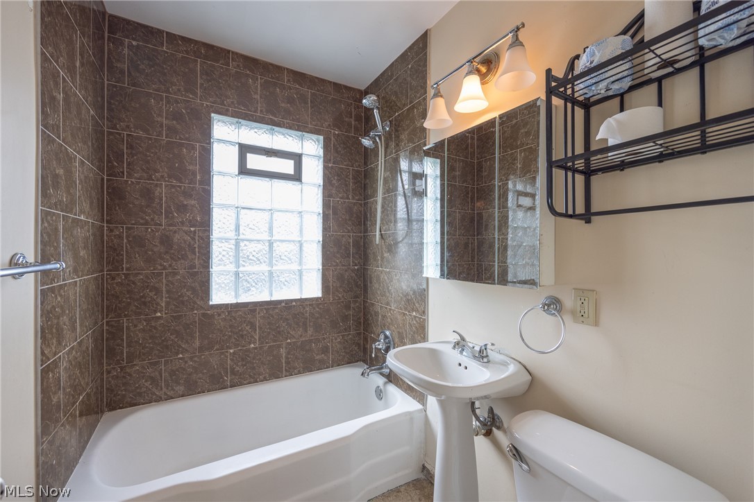 4344 West Anderson Road South Euclid, OH 44121 - Photo 11 of 14 Bathroom featuring toilet and tiled shower / bath