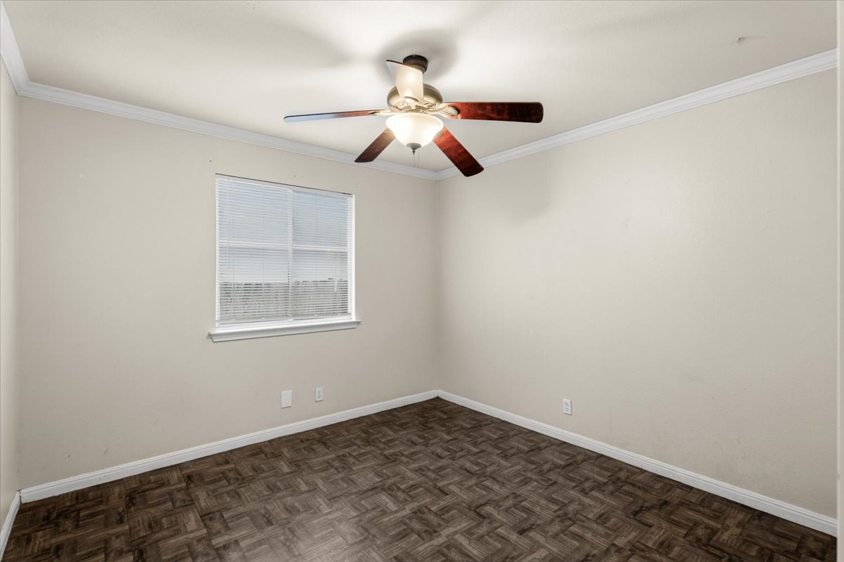 281 Leonardo Kyle, TX 78640 - Photo 17 of 38 an empty room with ceiling fan and window
