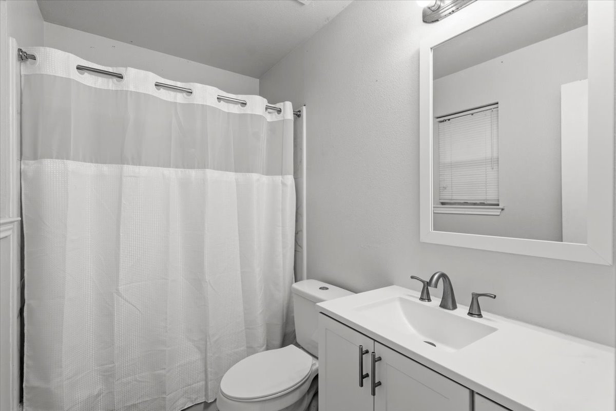 281 Leonardo Kyle, TX 78640 - Photo 21 of 38 a bathroom with a sink a toilet and shower
