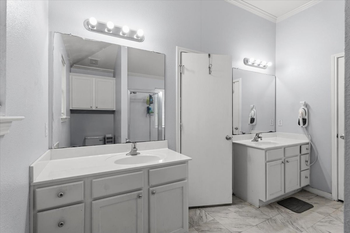 281 Leonardo Kyle, TX 78640 - Photo 26 of 38 a bathroom with a sink double vanity and a mirror