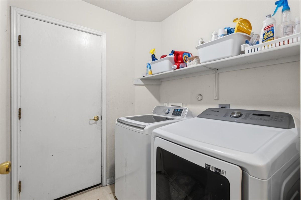 281 Leonardo Kyle, TX 78640 - Photo 29 of 38 a utility room with dryer and washer
