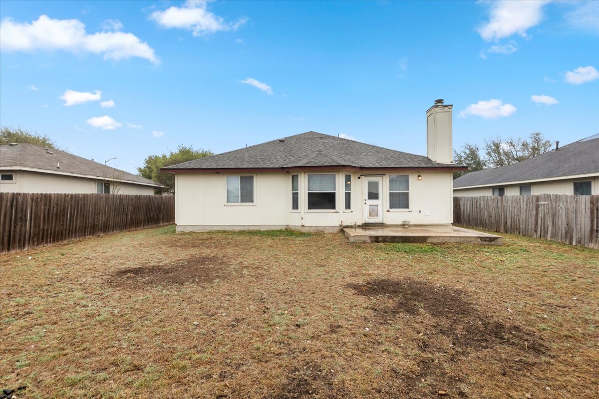 281 Leonardo Kyle, TX 78640 - Photo 30 of 38 a backyard of a house