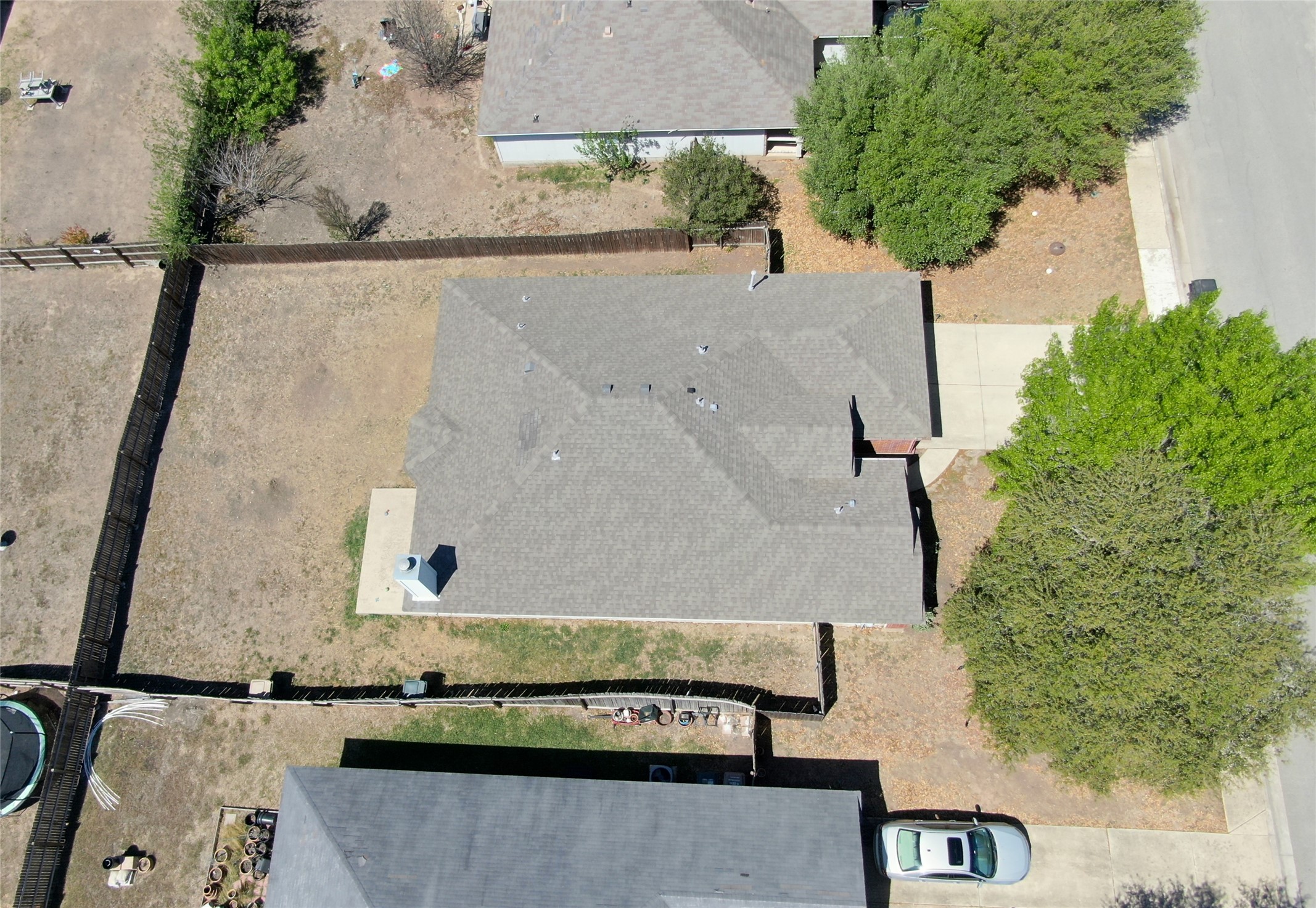 281 Leonardo Kyle, TX 78640 - Photo 37 of 38 an aerial view of a house with a yard