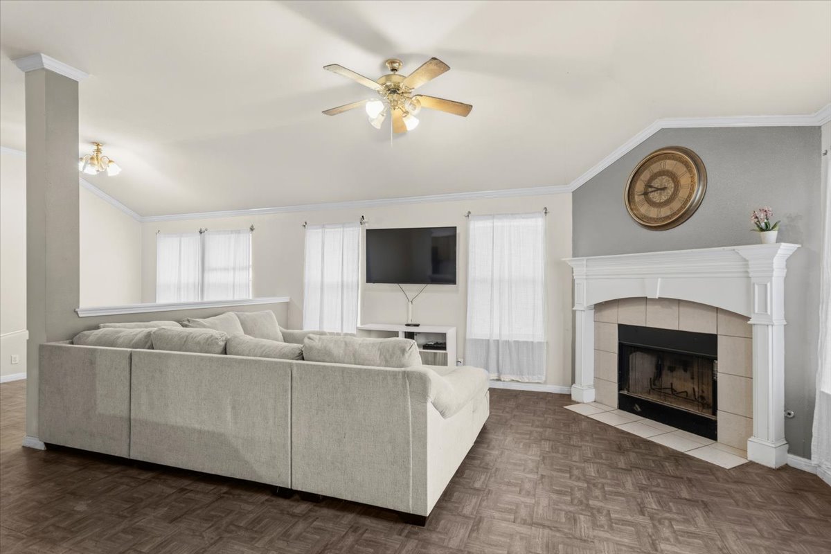 281 Leonardo Kyle, TX 78640 - Photo 6 of 38 a living room with furniture and a fireplace