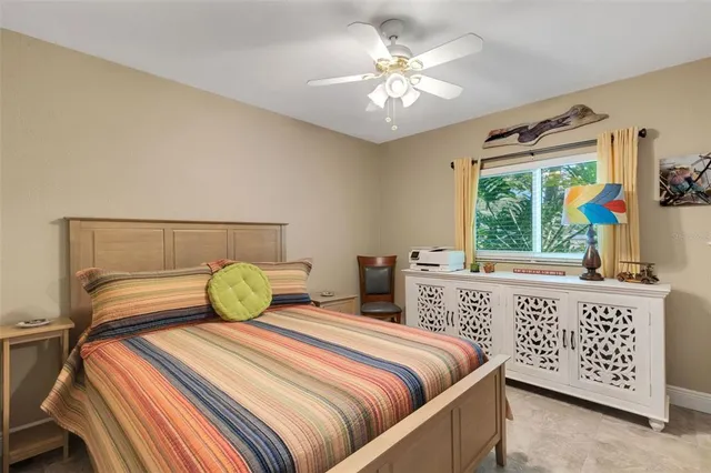 a bathroom with a toilet a sink and a mirror