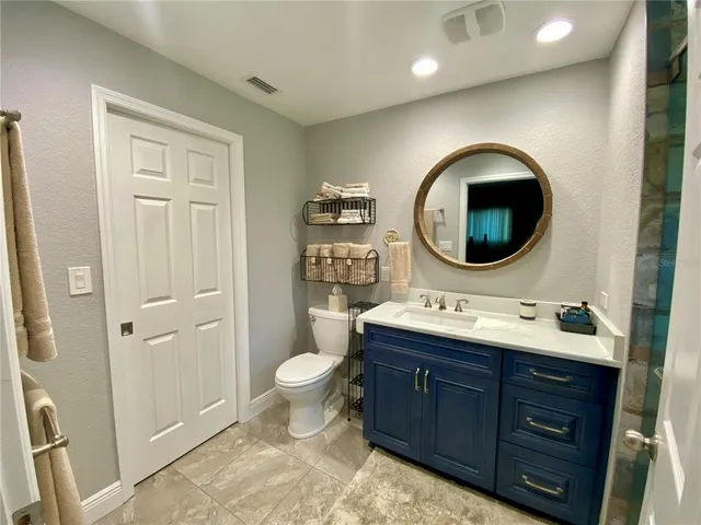 a view of walk in closet with window