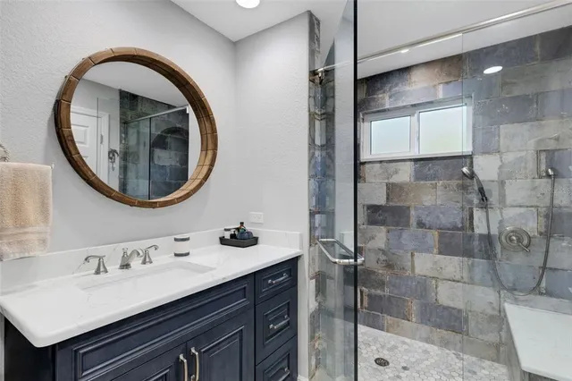 a view of a yard with plants and trees