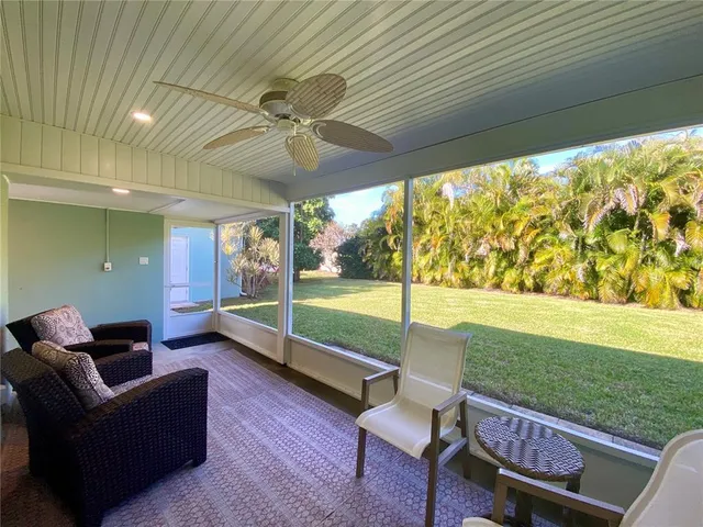 a kitchen with wooden cabinets and sink