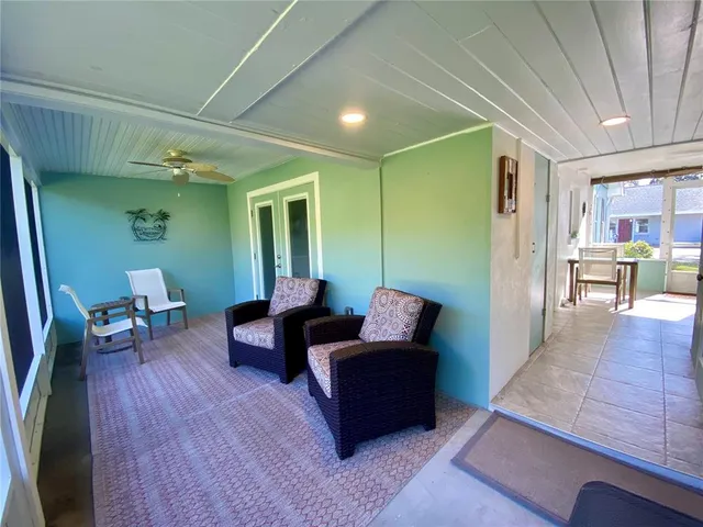 an aerial view of residential building with outdoor space and lake view