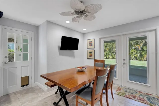 a kitchen with stainless steel appliances granite countertop a refrigerator stove a sink and dishwasher