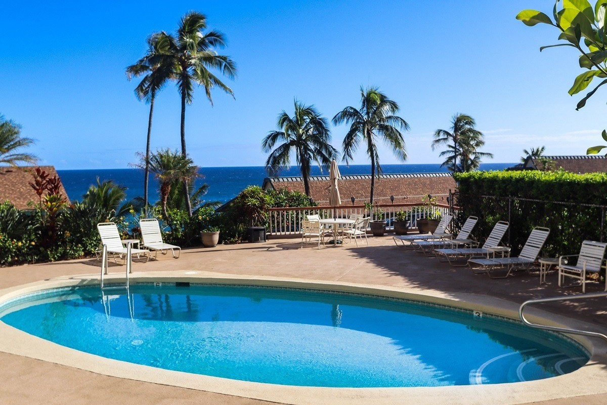1763 Pe'e Road, Unit 305 Koloa, HI 96756 - Photo 13 of 14 a view of a swimming pool with a patio