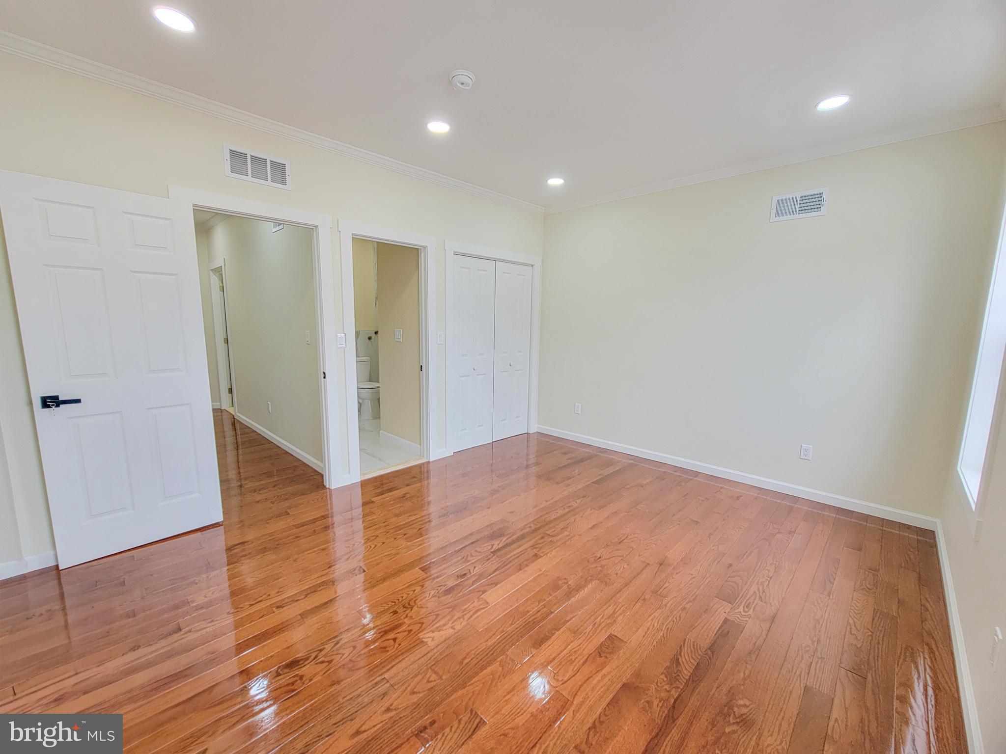 5502 Master Street Philadelphia, PA 19131 - Photo 11 of 63 a view of empty room with wooden floor