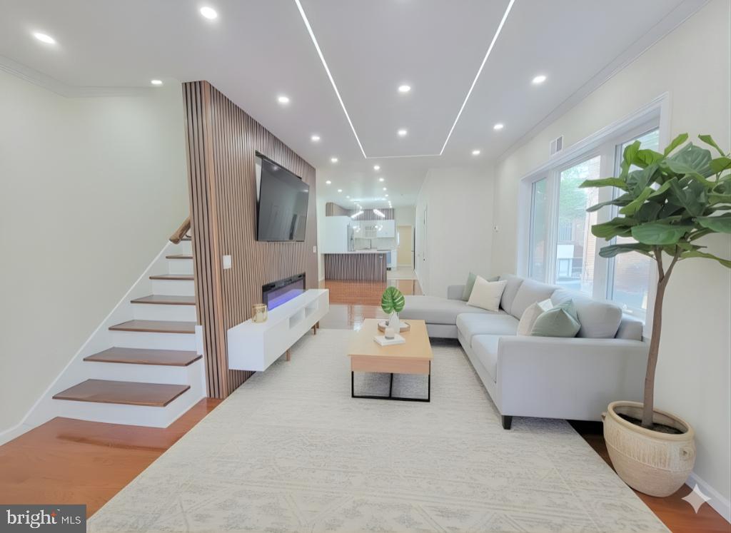 5502 Master Street Philadelphia, PA 19131 - Photo 2 of 63 a living room with furniture and a potted plant
