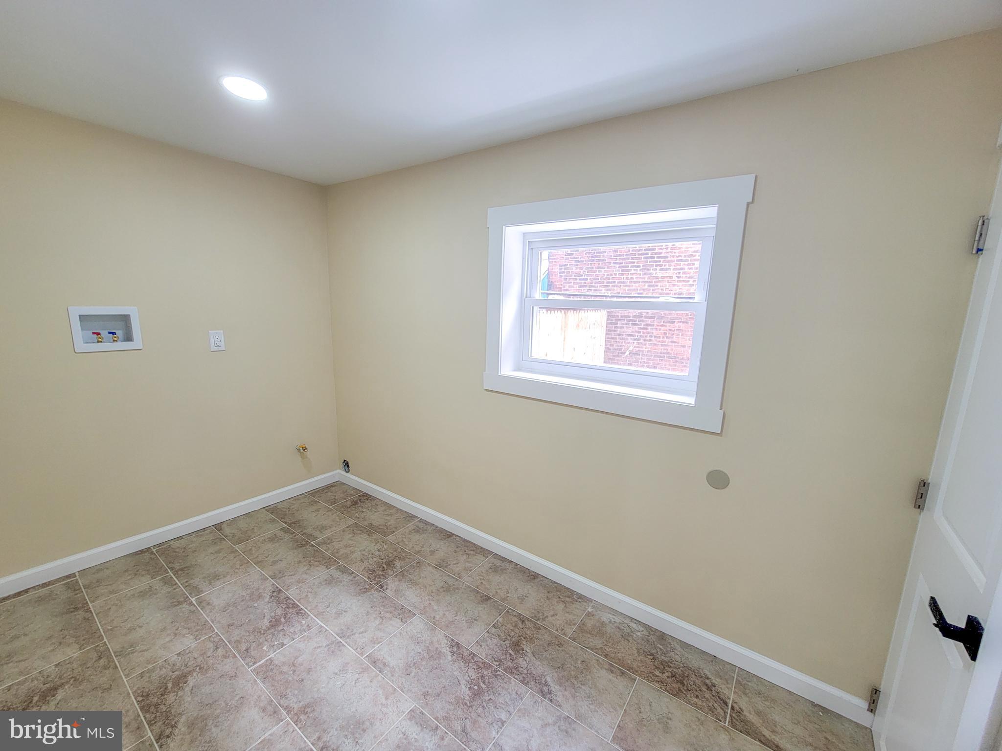 5502 Master Street Philadelphia, PA 19131 - Photo 21 of 63 an empty room with a window