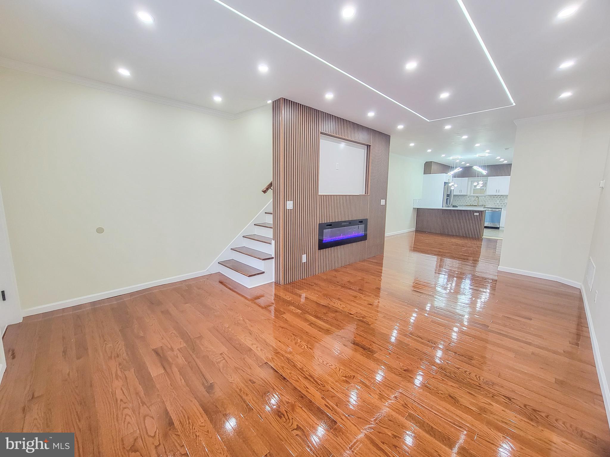 5502 Master Street Philadelphia, PA 19131 - Photo 4 of 63 a view of a big room with wooden floor and windows