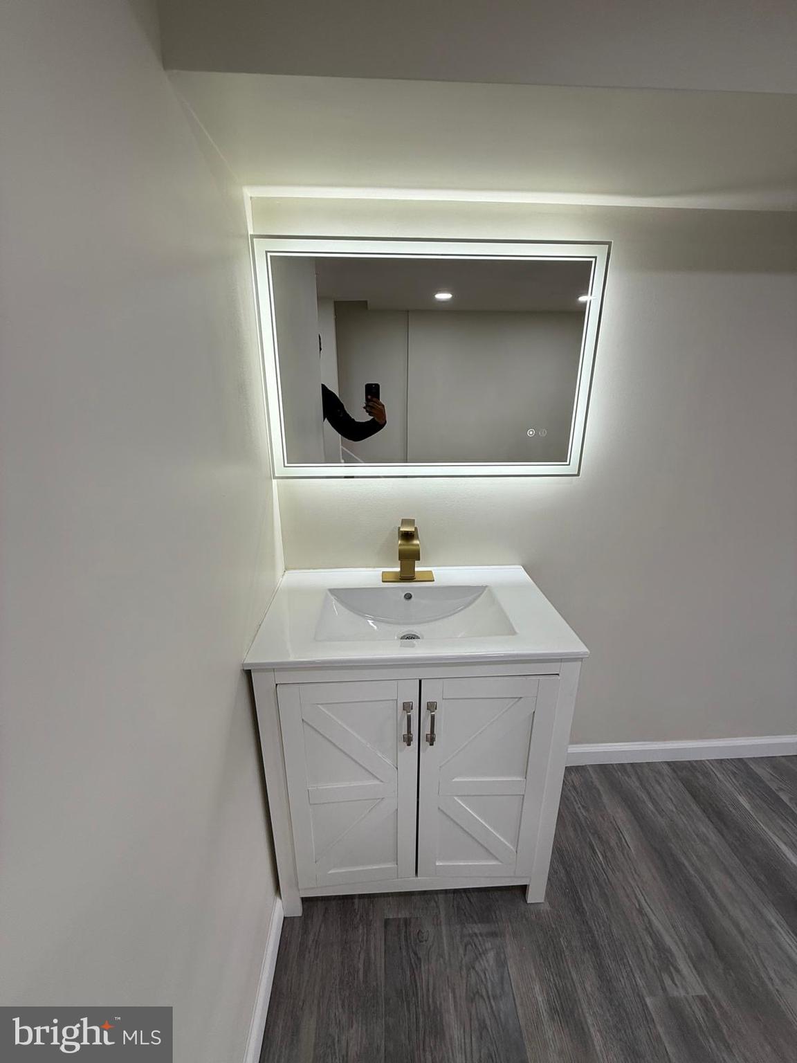 5502 Master Street Philadelphia, PA 19131 - Photo 47 of 63 a utility room with a sink and mirror