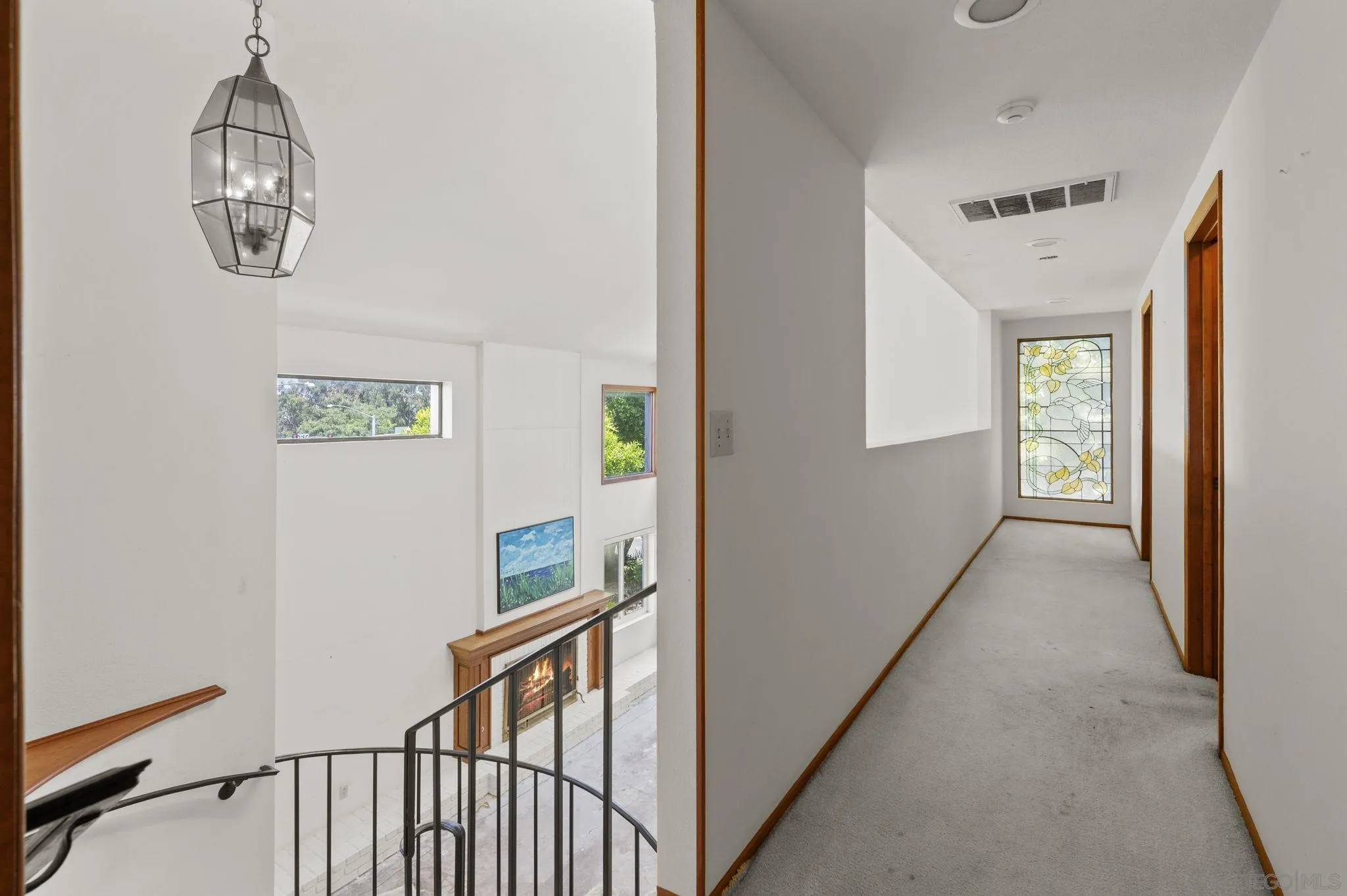 2029 Del Mar Heights Road Del Mar, CA 92014 - Photo 17 of 51 a view of a hallway view with wooden floor and staircase