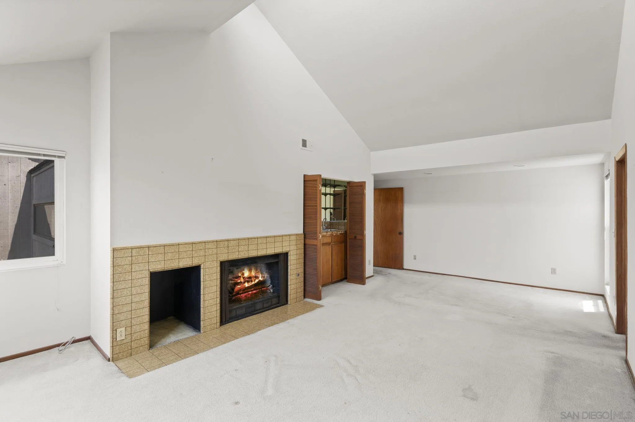 2029 Del Mar Heights Road Del Mar, CA 92014 - Photo 20 of 51 a view of an empty room with a fireplace