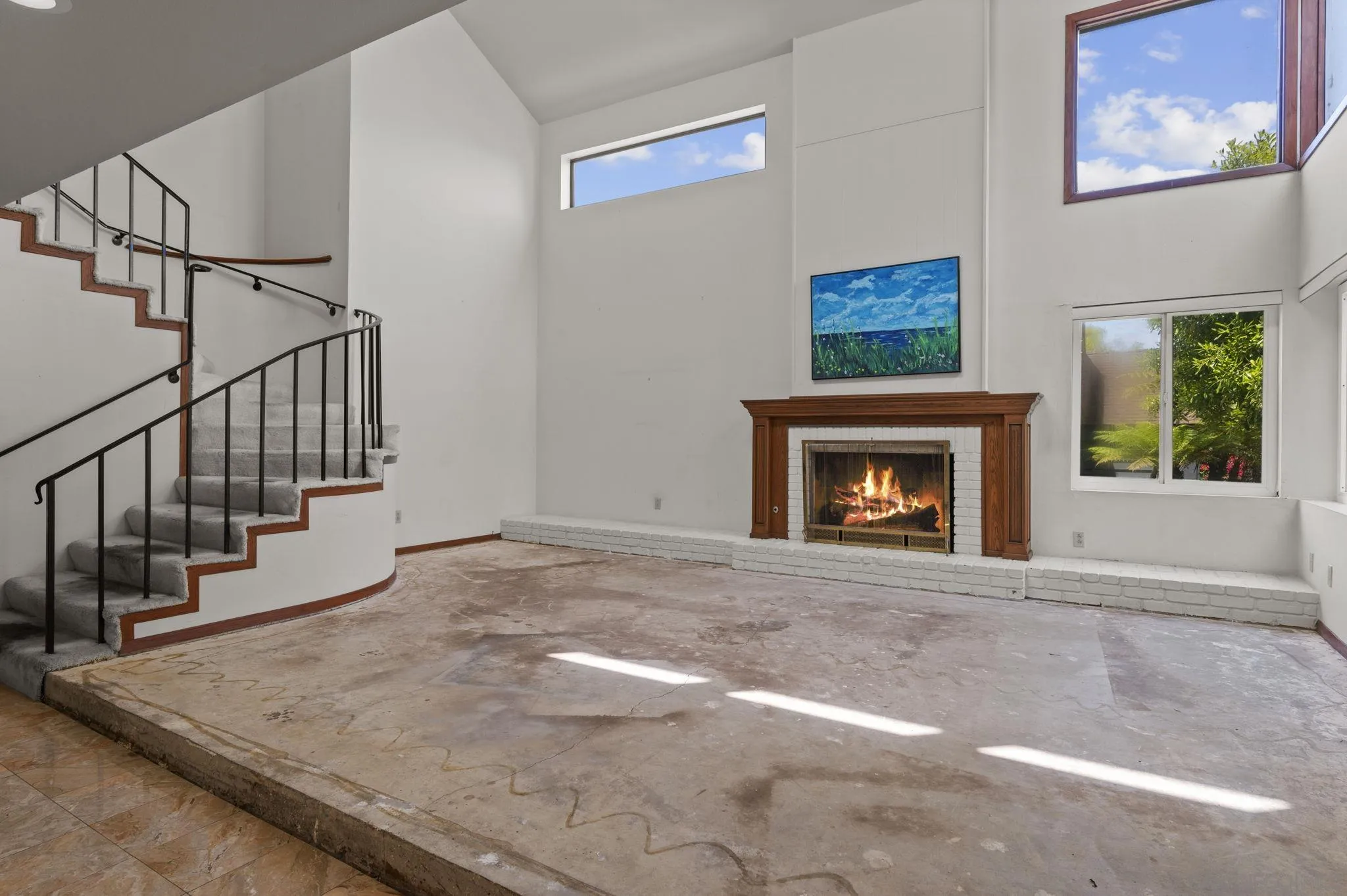 2029 Del Mar Heights Road Del Mar, CA 92014 - Photo 4 of 51 a view of an empty room with fireplace and a window