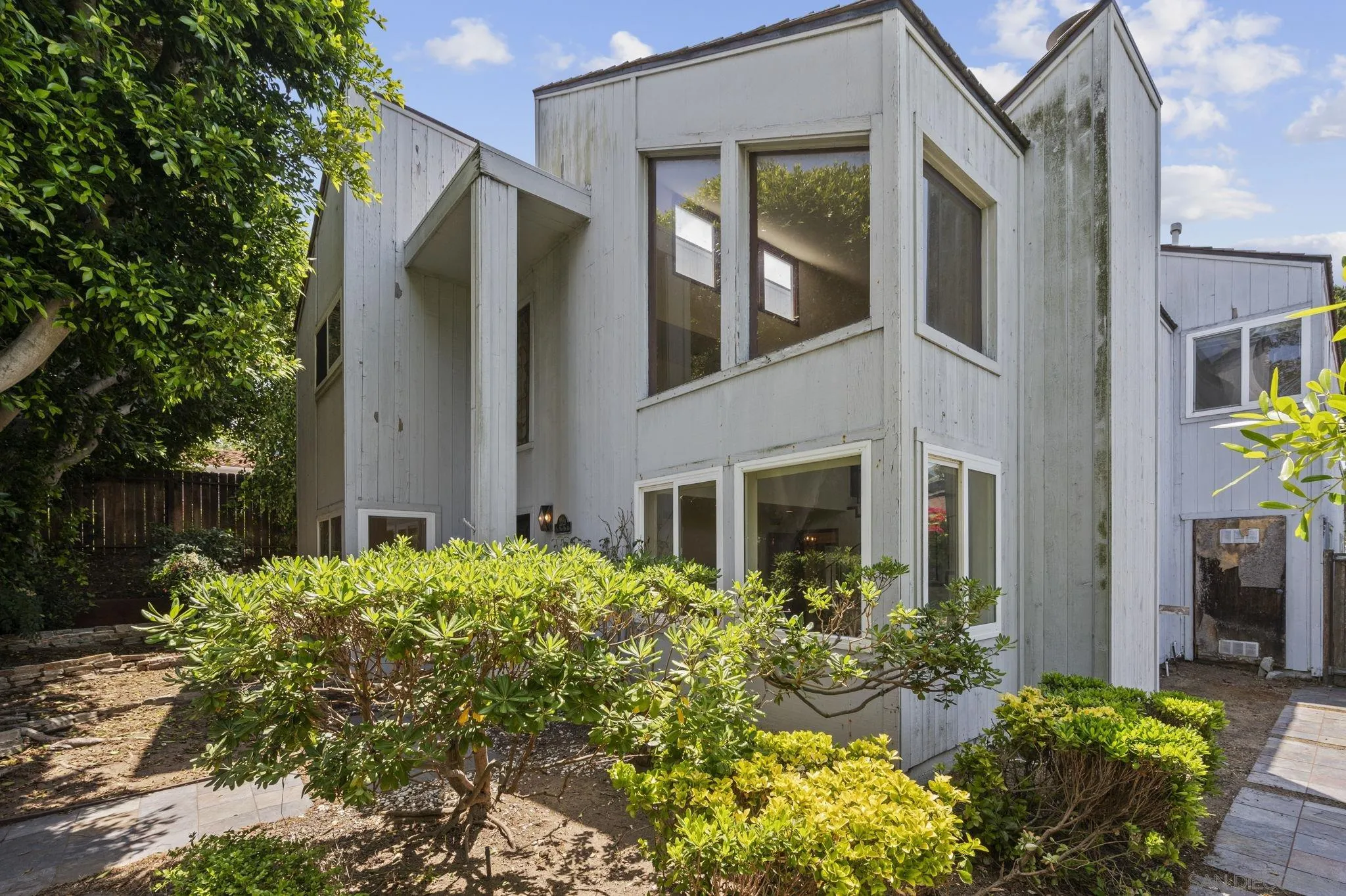 2029 Del Mar Heights Road Del Mar, CA 92014 - Photo 43 of 51 a view of a house with potted plants