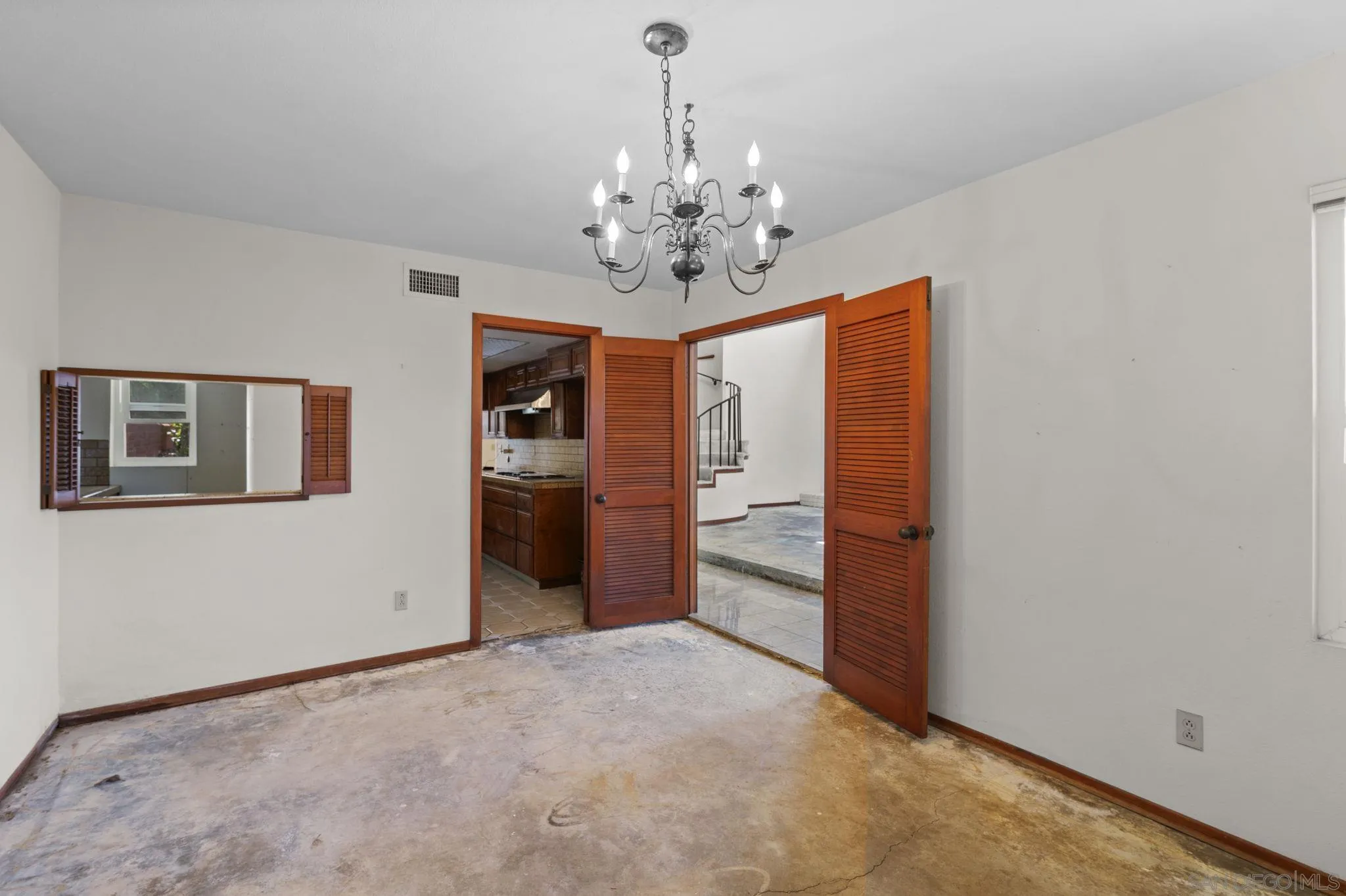 2029 Del Mar Heights Road Del Mar, CA 92014 - Photo 7 of 51 a view of a kitchen with a sink and a refrigerator