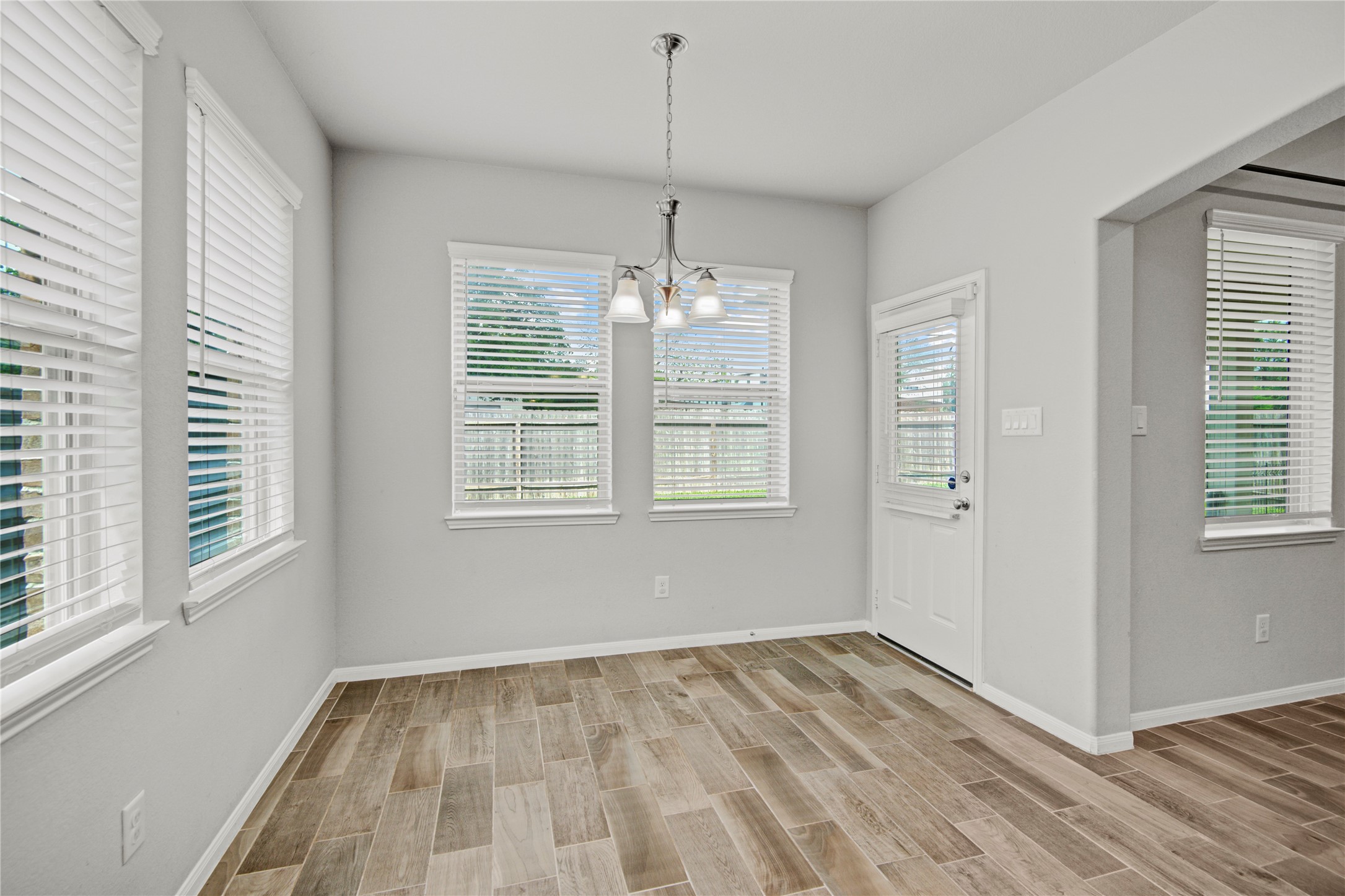 1314 Orchard Ridge Lane Tomball, TX 77375 - Photo 17 of 35 The breakfast nook is filled with natural light and offers a comfortable space for casual dining.