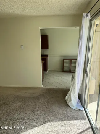 a kitchen with stainless steel appliances a stove a refrigerator and a cabinets