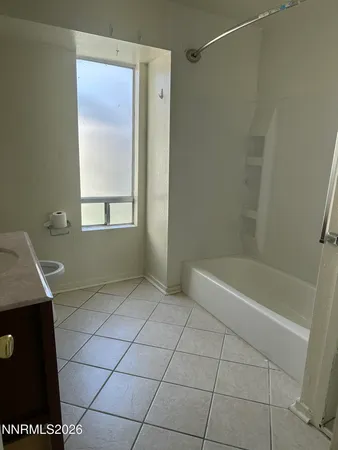 a view of a window in an empty room
