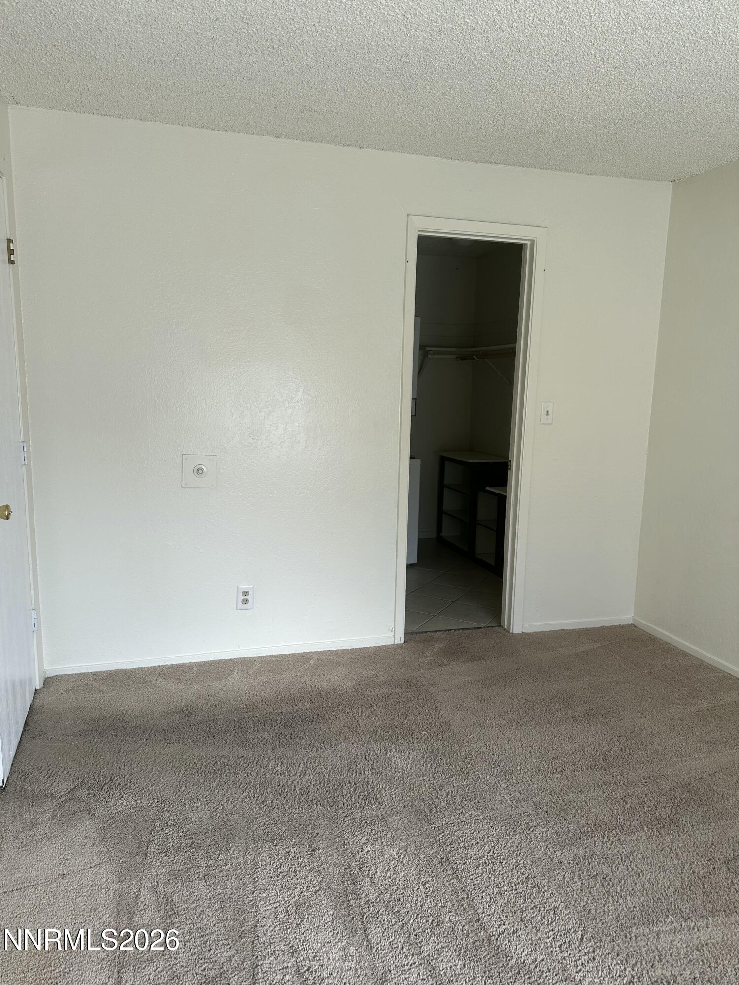 3928 Clear Acre Lane, Unit 116 Reno, NV 89512 - Photo 9 of 12 a view of an empty room