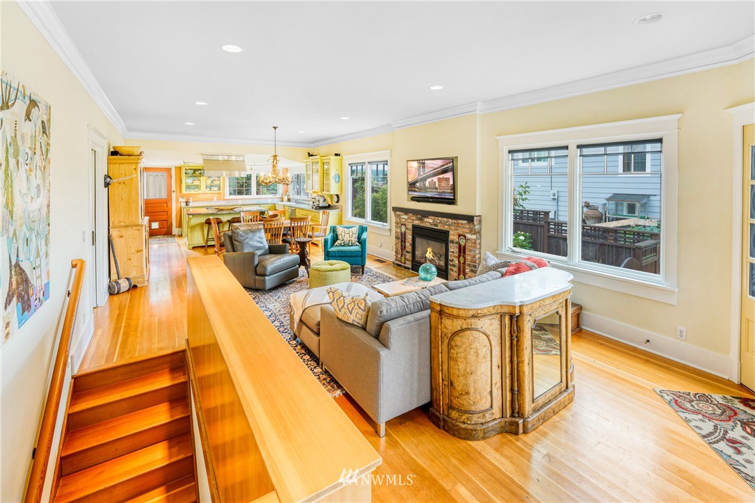 415 5th Street Anacortes, WA 98221 - Photo 22 of 38 a living room with stainless steel appliances furniture and a rug