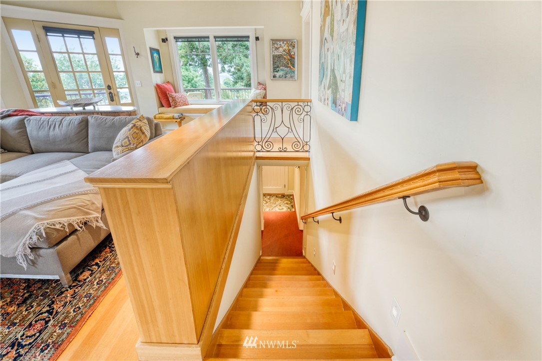 415 5th Street Anacortes, WA 98221 - Photo 23 of 38 a view of a living room with a window and wooden floor