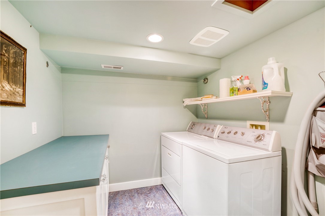 415 5th Street Anacortes, WA 98221 - Photo 27 of 38 a utility room with dryer and washer