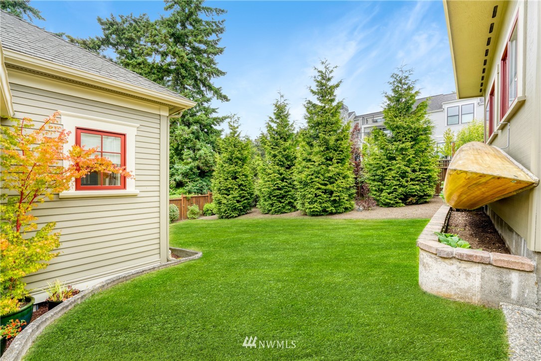 415 5th Street Anacortes, WA 98221 - Photo 37 of 38 a view of a backyard with plants and a patio