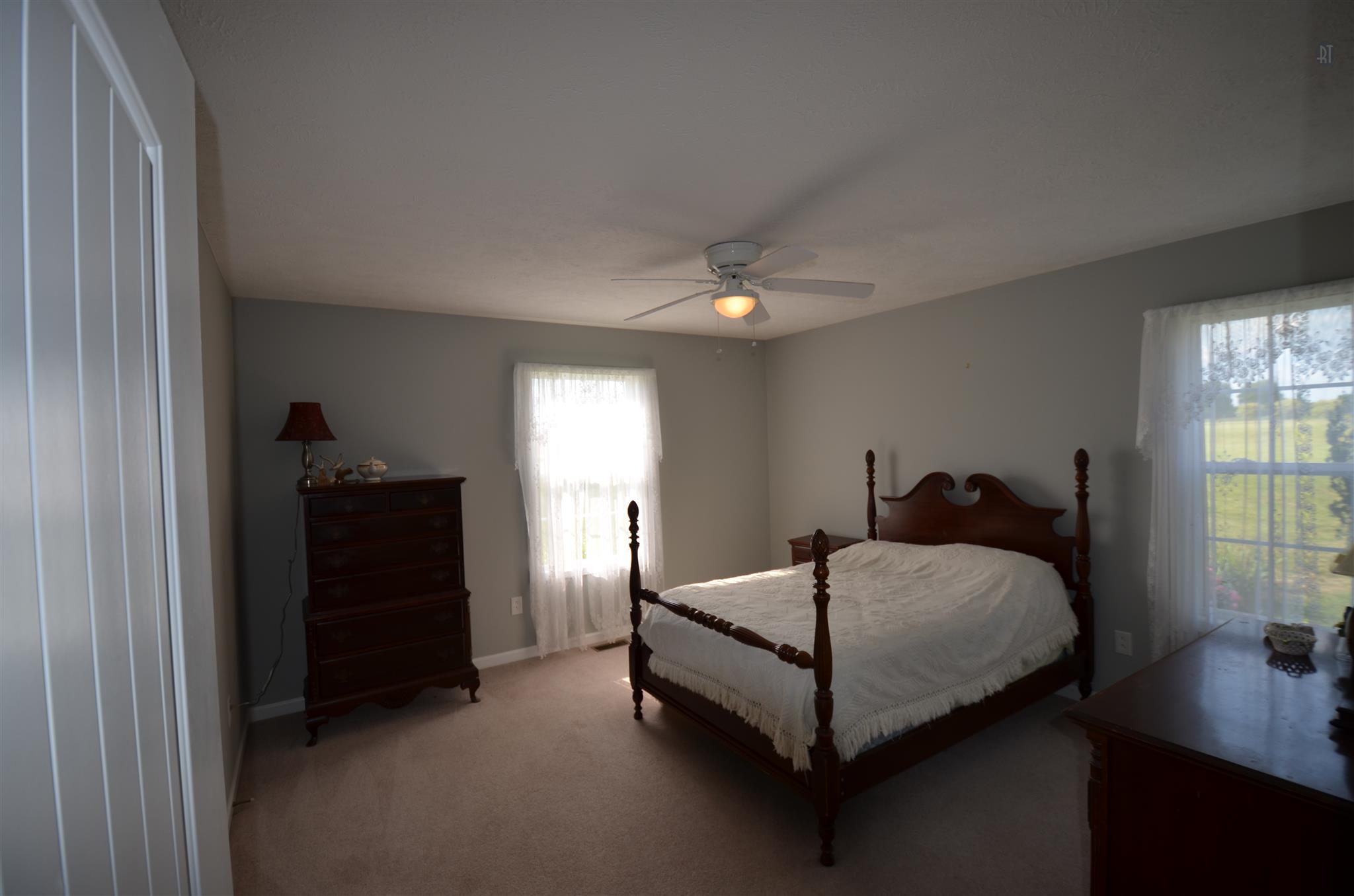 142 County Line Road Bell Buckle, TN 37020 - Photo 11 of 11 a bedroom with a bed and window