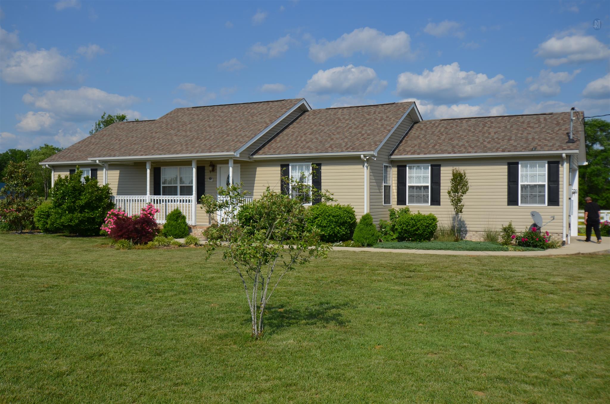 142 County Line Road Bell Buckle, TN 37020 - Photo 2 of 11 a front view of house with yard outdoor seating and green space