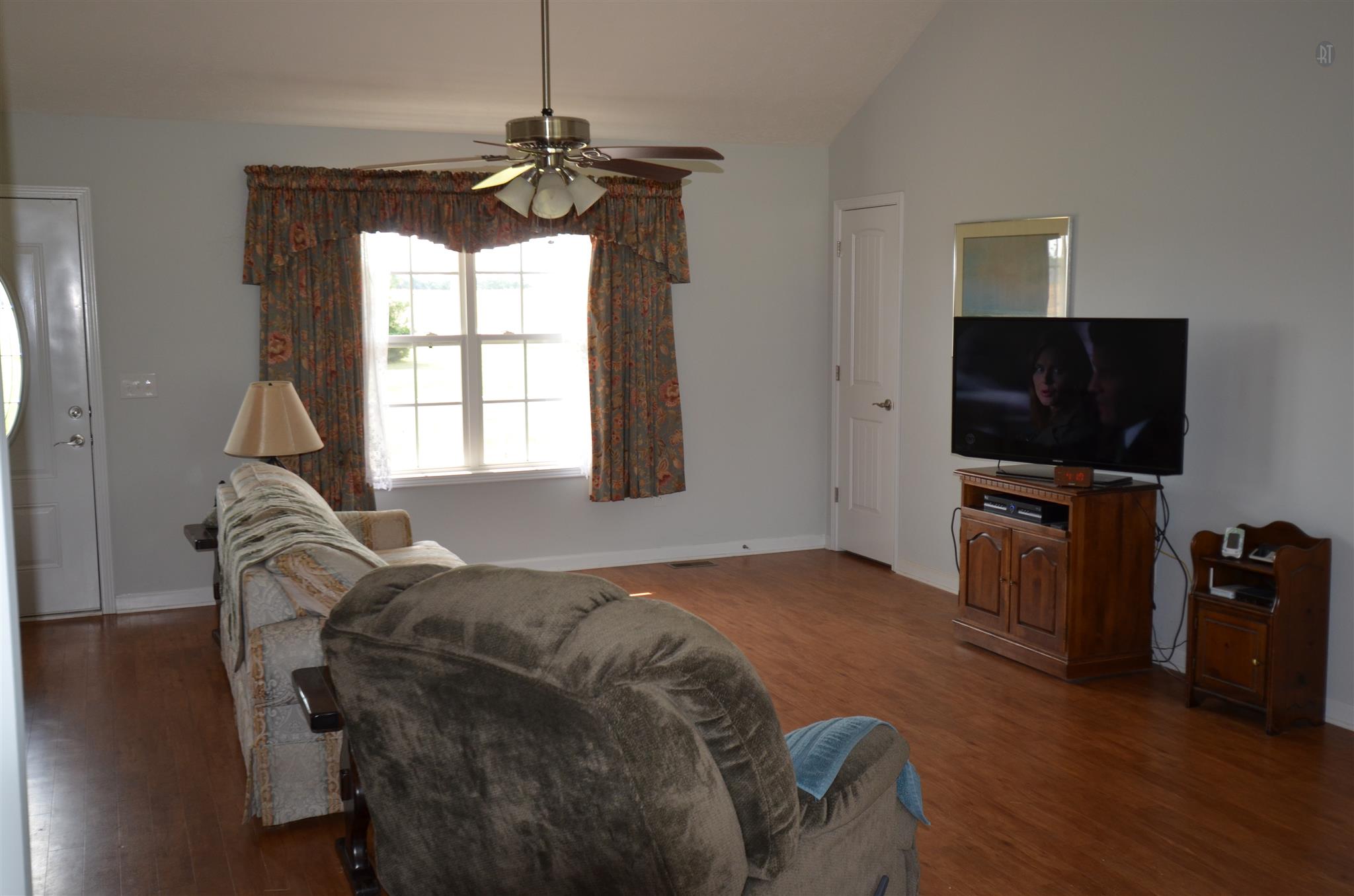 142 County Line Road Bell Buckle, TN 37020 - Photo 9 of 11 a bedroom with a bed and a flat screen tv