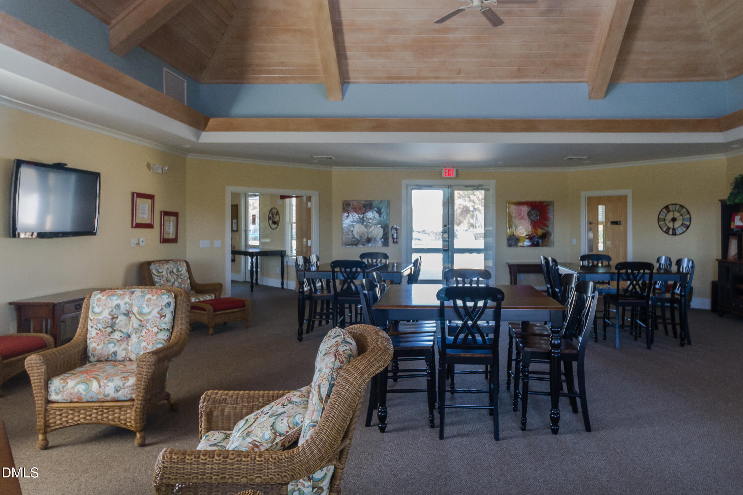 191 High Ridge Lane Pittsboro, NC 27312 - Photo 29 of 54 a dining room with furniture a rug and wooden floor