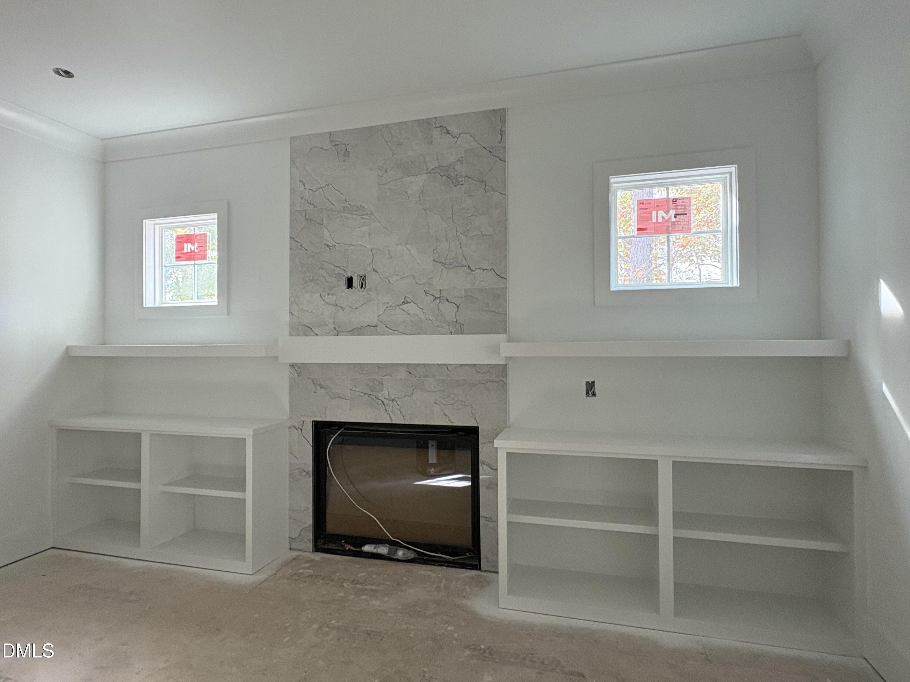 191 High Ridge Lane Pittsboro, NC 27312 - Photo 7 of 54 a living room with furniture and a fireplace