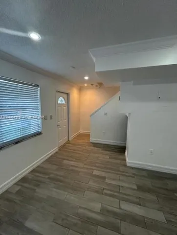 a view of a livingroom with an empty space