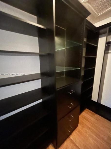 35 Northeast 12th Avenue, Unit 35 Homestead, FL 33030 - Photo 20 of 22 a bathroom with a walk in closet