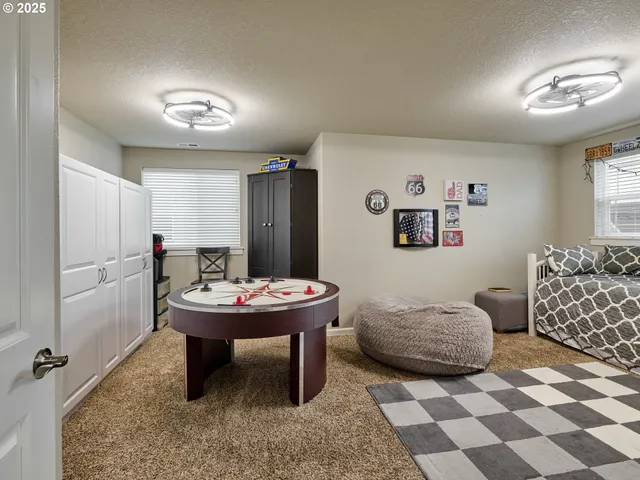 a utility room with shower and sink