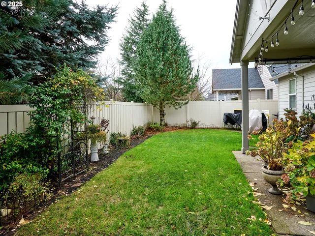 an aerial view of a houses with outdoor space